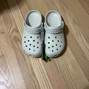 ADULTS' CROCS CLASSIC CLOGS
Crocs
- Cream.Size 8 men’s and 10 women’s